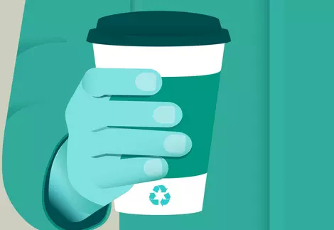 Hand holding a recyclable cup