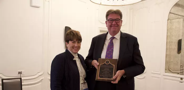 Chris Parr received an award at the UNITECR in Chicago