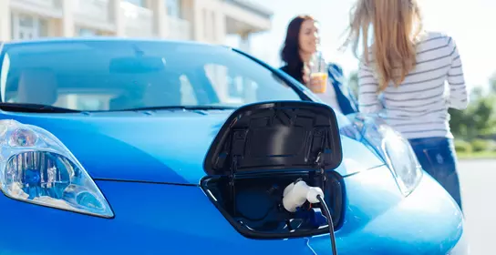 Electric car being charged
