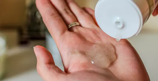 Cosmetic product squeezed onto the palm