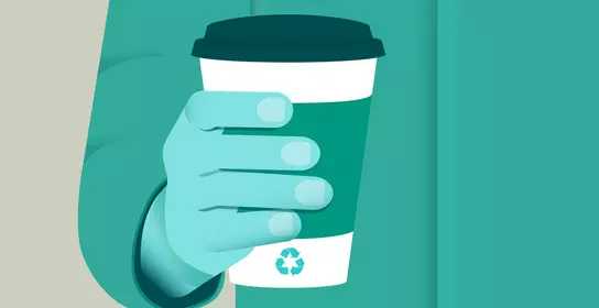 Hand holding a recyclable cup